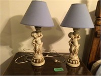 pair of cherub lamps