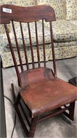 Early Antique, red painted rocking chair.
