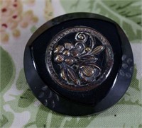 Large Bakelite Button With Floral Escutcheon