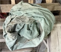 Unknown size and condition green canvas tarp