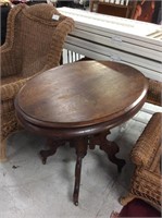 Oval wooden accent table
