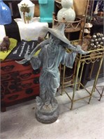Asian water carrier statue