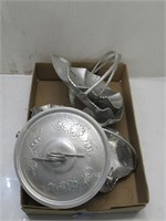 silver colored metal serving trays and dishes