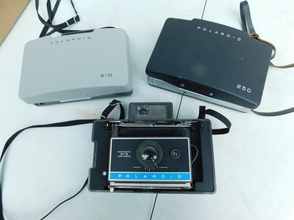 Three Polaroid Automatic land cameras, untested