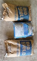 2 bags of fertilizer, 1 bag pelletized limestone