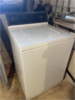 MAYTAG WASH MACHINE IN BASEMENT