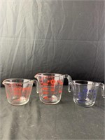 3- Pyrex measuring cups