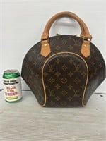 Marked Louis Vuitton bucket purse authenticity