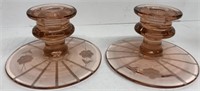 Pair of pink Depression candleholders