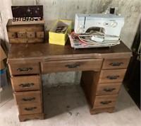 Elna sewing machine, cabinet, plus accessories