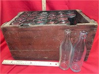 Wooden case of Muscatine bottles