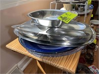 Group of stainless steel serving dishes