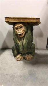 Ape holding book table
Antique