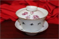 An Antique Chinese Teacup and Saucer