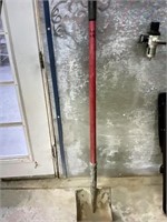 Red handled shovel