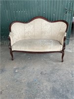 Victorian carved walnut loveseat