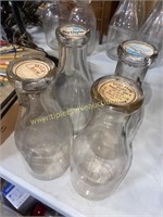 4 milk bottles