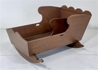 Walnut cradle, divided for twins, raised head has
