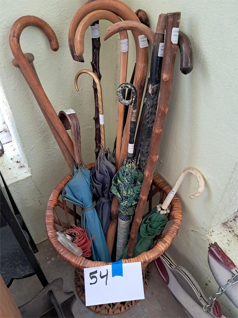 Basket w/canes and umbrellas