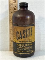 Vintage bottle of Casite sludge solvent still