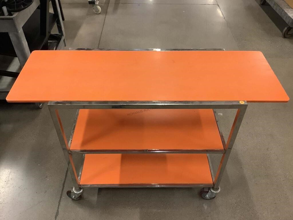 Rolling Orange Plastic and Metal Room Service