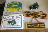 John Deere signs, toy plastic tractor