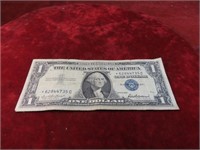 1957 $1 Silver certificate US banknote. Star