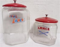 2 Lance glass display jars
