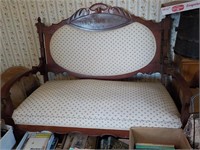 Victorian settee carved and inlaid back 48"