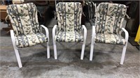 Lot of three patio chairs with cushions