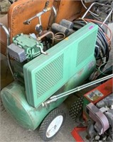 Speedaire Air Compressor on Cart with Hoses.