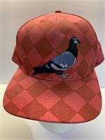 Pigeon snap to fit ball cap appears in good