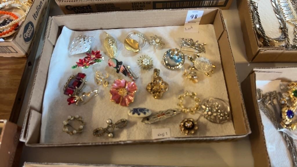 Box of vintage earrings and piercings