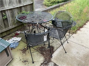 ROUND PATIO TABLE WITH THREE MATCHING CHAIRS