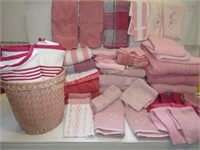 Assorted Towels in Pink + Wicker Wastebasket