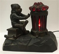 Figural Spelter And Red Light Lamp