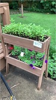 2 flower planters, with two boxes, and each one