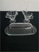 Vintage creamer and sugar dishes, and a butter