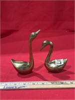 2 brass ducks