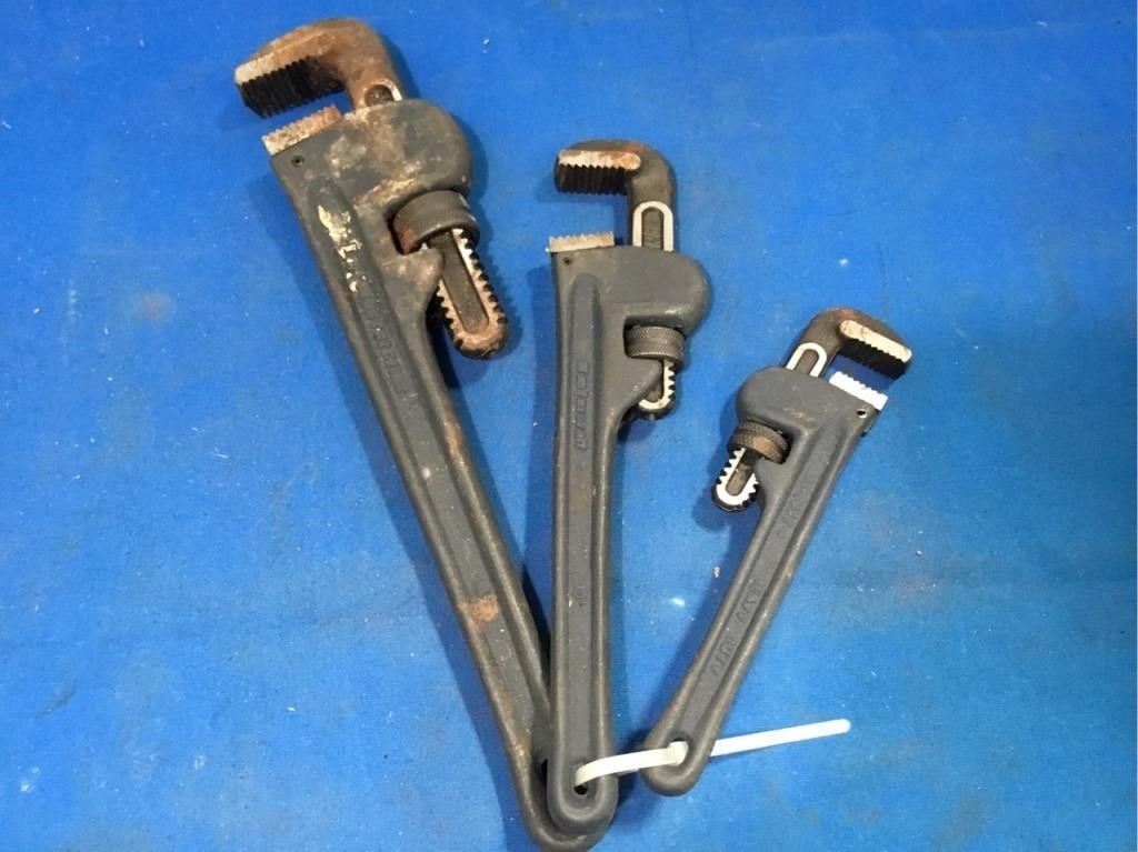 Adjustable wrenches