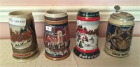4 Unmatched Budweiser collector stein, 6 3/4" to