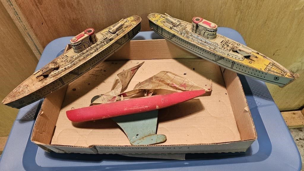 Vintage military boat toys one with gears one