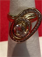 14 karat gold ring. Size 7. Motion ring with two