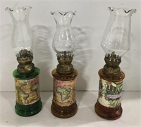 Glass and metal oil lamps