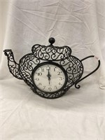 Decorative wall hanging teapot with a quartz clock