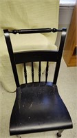 2 Black wooden chairs