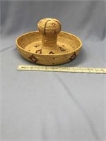 A very unusual native made woven grass basket with