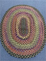Large multi colored braided rug 5.5 x 4.5