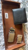 Billfold, belt buckles, tray