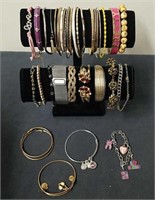 Group of bracelets and a pair of earrings